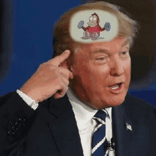 a man in a suit and tie has a cartoon character on his forehead
