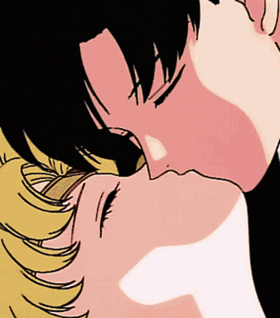 a close up of a person kissing another person 's face