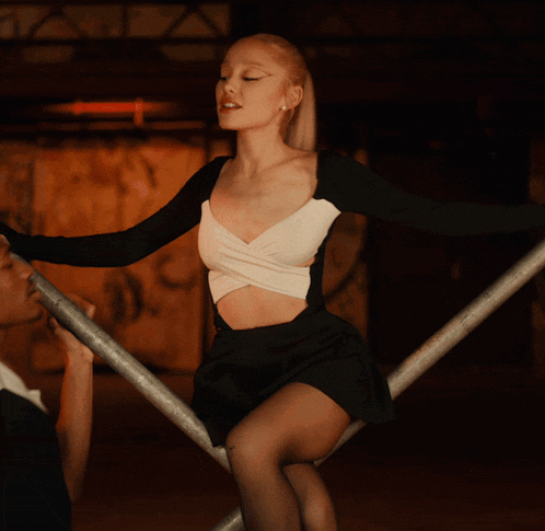 a man and a woman are dancing together in the dark