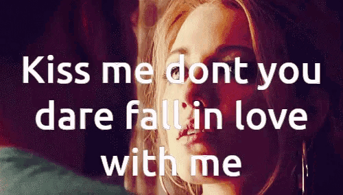 a picture of a woman with the words kiss me dont you dare fall in love with me on it