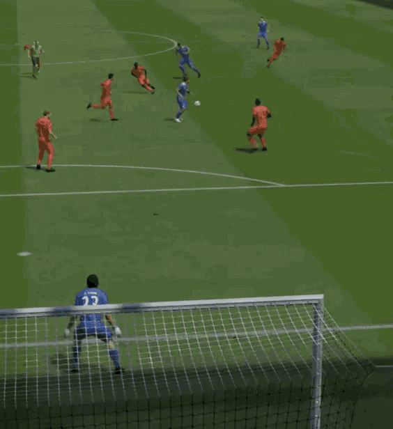 a soccer goalie wearing a blue jersey with the number 23 on it