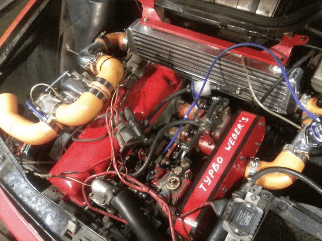 a turbo webers engine is being worked on