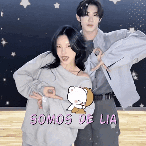 a man and a woman are posing for a picture and the words somos de lia are visible