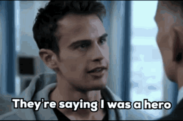 a man talking to another man with the words they 're saying i was a hero