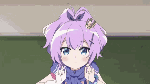 a cute anime girl with purple hair and blue eyes is sitting in front of a green board .