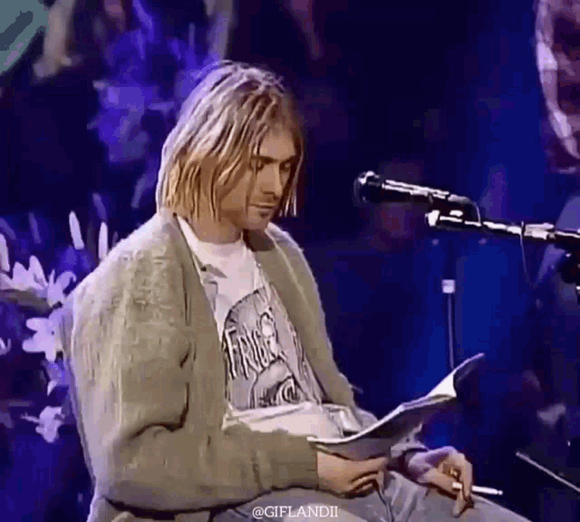 Kurt Cobain Reading GIF - Kurt Cobain Reading GIFs