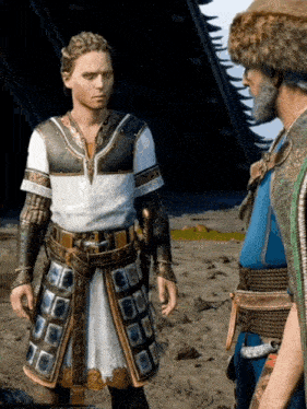 a man in armor is standing next to another man