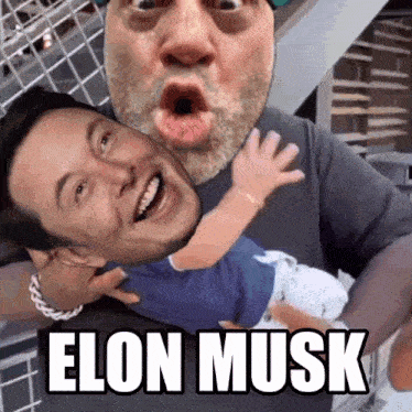 a man is holding a baby with elon musk written below him
