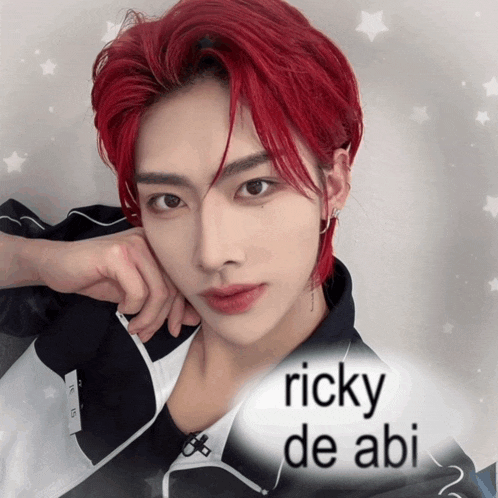 a young man with red hair has the name ricky de abi on the bottom