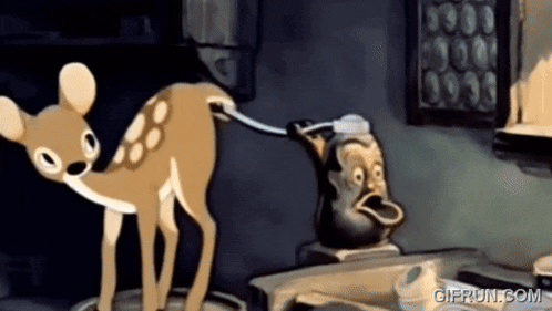 a gif from giffun.com shows a deer licking a teapot