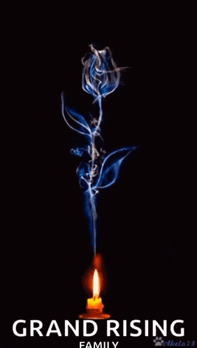 a blue rose with smoke coming out of it and a candle .