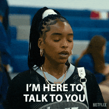 a woman in a ponytail says " i 'm here to talk to you "