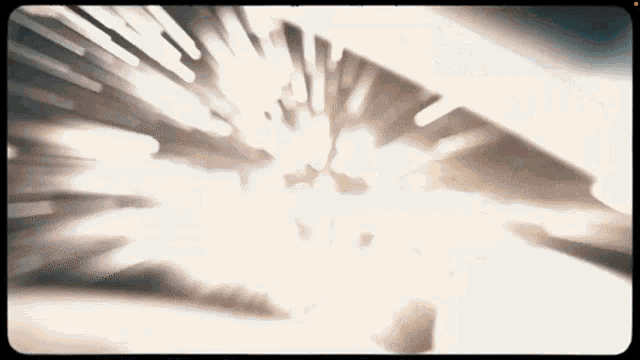 a blurry image of a light coming out of a hole