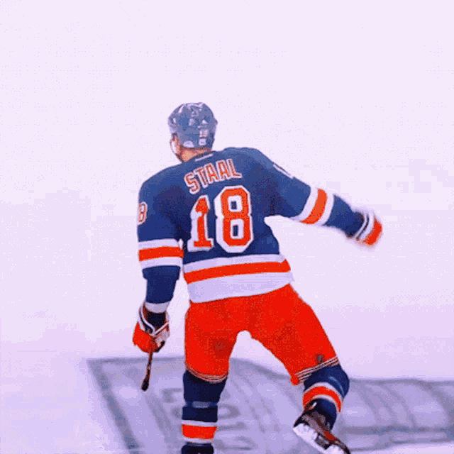 a hockey player with the name staal on his back