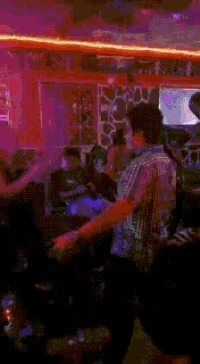 a pixelated image with a green light coming out of it