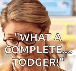 a woman wearing glasses is talking on a cell phone and says `` what a complete todger ! ''