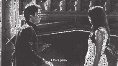 a black and white photo of a man and a woman with the words i love you on the bottom