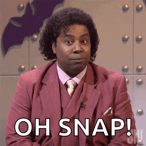 a man in a suit says oh snap