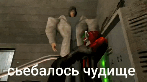 a man in a white coat is standing next to a red object in a room .