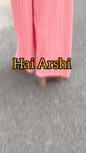 a woman is wearing pink pants with the words hai aashi on the bottom