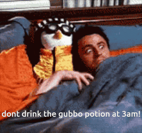 a man is laying in bed with a stuffed penguin and the words " dont drink the gubbo potion at 3am " below him