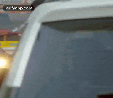 a close up of a car 's windshield with the words kulfyapp.com on the bottom