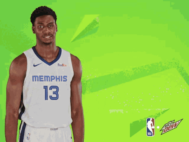 a basketball player wearing a jersey that says memphis 13 on it