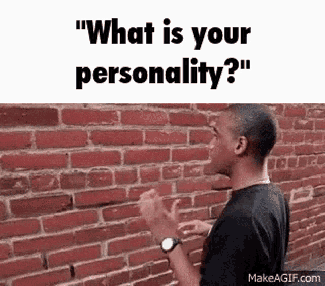 a man is standing in front of a brick wall talking to someone .