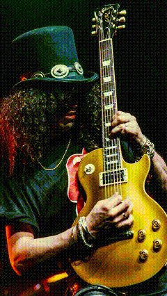 a man with curly hair is playing a guitar and wearing a top hat