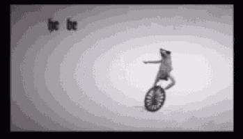 a frog is riding a unicycle with the words he be written on the bottom