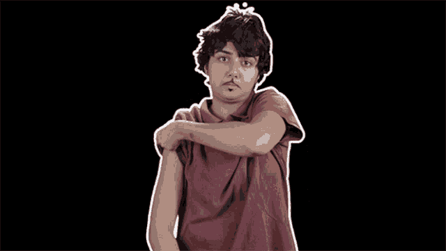 a man in a red shirt is flexing his muscles in front of a purple background