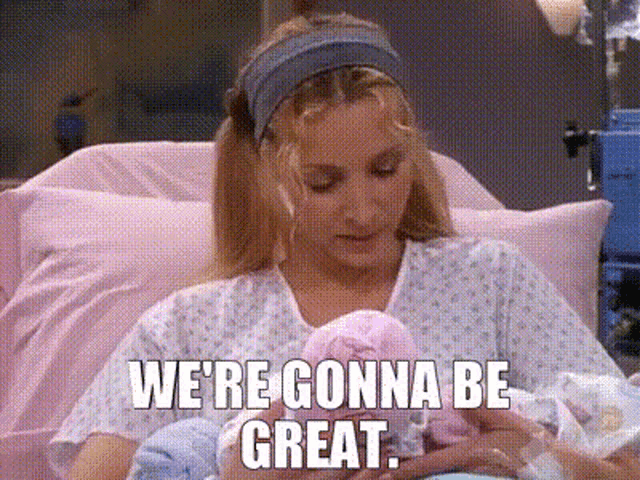 a woman in a hospital gown is holding a baby and says we 're gonna be great ..