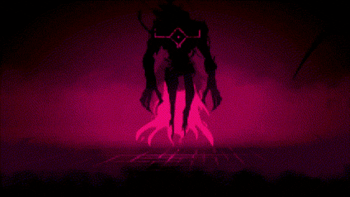 a silhouette of a monster in a dark room with a red light behind it .