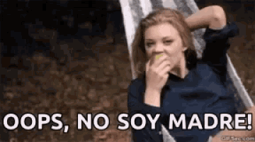a woman is sitting in a hammock eating an apple and saying oops no soy madre .