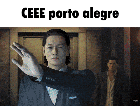 a man in a suit is making a stop gesture with the words ceee porto alegre behind him