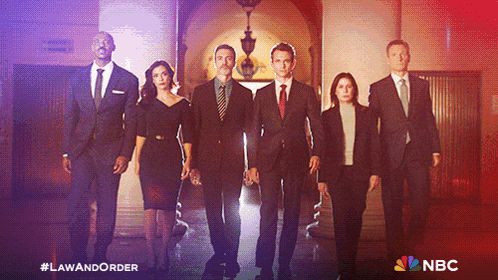 a group of people standing next to each other with nbc on the bottom