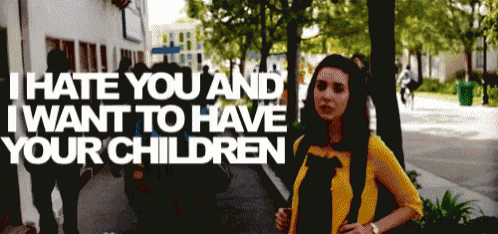 a woman walking down a sidewalk with the words " i hate you and i want to have your children " behind her