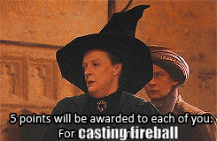 a woman in a witch hat says 5 points will be awarded to each of you for casting a fireball