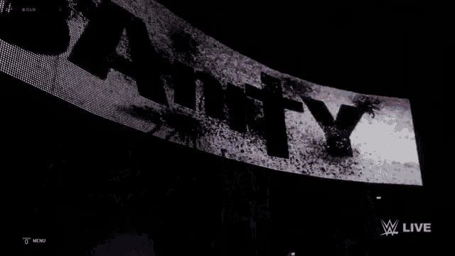 a black and white image of a sign that says unity
