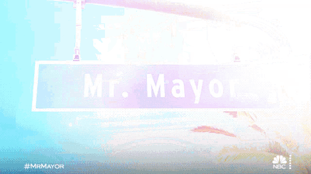 a statue of a man with the word mayor on his shirt