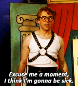 a man in a white tank top says excuse me a moment i think i 'm gonna be sick .