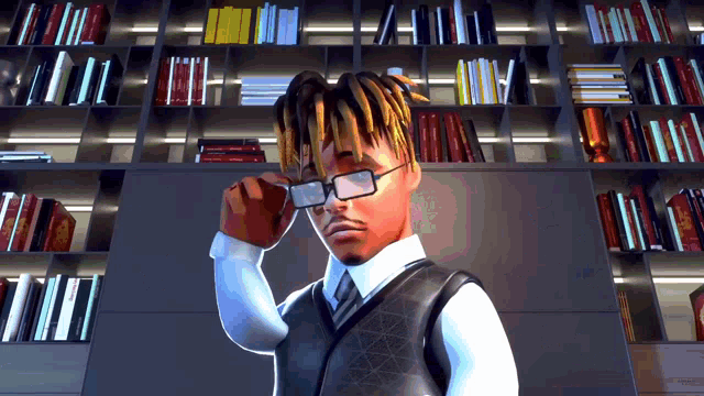 a man wearing glasses stands in front of a book shelf