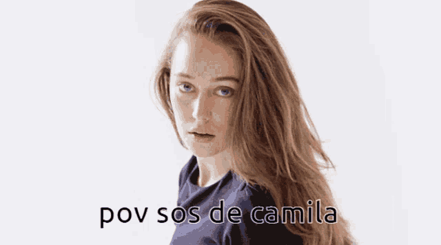 a woman with long hair is standing in front of a white background with the words pov sos de camila below her