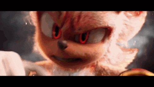 a close up of a sonic the hedgehog with red eyes and white fur .