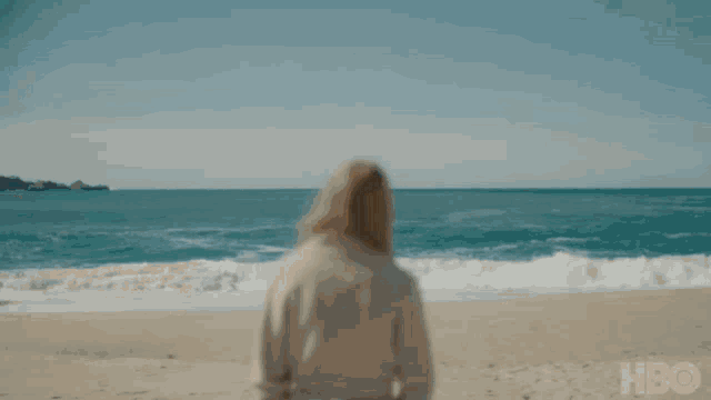 a close up of a woman 's face with the word hbo on the bottom right