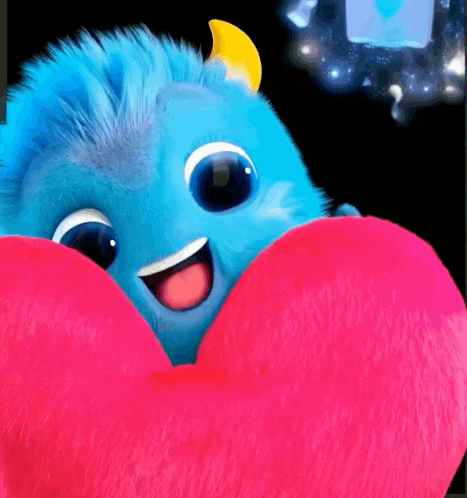 a blue monster is holding a pink heart with its tongue out .