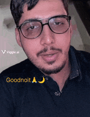 a man wearing glasses and a black shirt with the words goodnoit below him