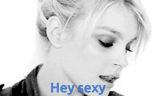 a black and white photo of a woman with the words hey sexy in blue
