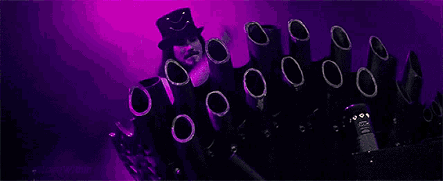 a purple and black object with the words faces stacked within