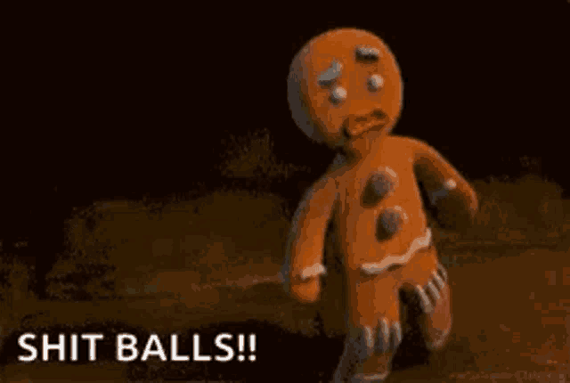 a gingerbread man is standing in the dirt with the words `` shit balls ! ''
